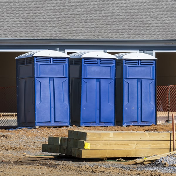 what is the cost difference between standard and deluxe porta potty rentals in Oakfield Michigan